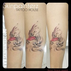 Simple bird tattoo