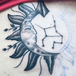 My fourth tattoo that is still unfinished! Local artist... Sun and Moon with the Virgo constelation in the center. 