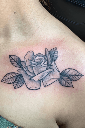 Stipple black and grey rose on chest 