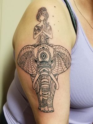 Henna style ornamental elephant with rider.