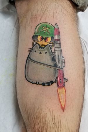 Pusheen with oozlefinch head and helmet strapped to an air defense missile like a jetpack.Original concept and design by me