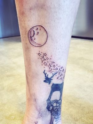 Moon and stars custom tattoo 