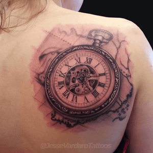 Pocket watch tattoo by Jesse Vardaro at Fable Tattoo Gallery