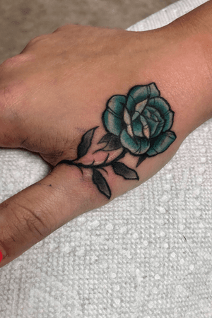 Little Rose on the hand. This is also a scar covered up