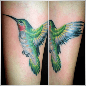 Painterly styled humming bird tattoo