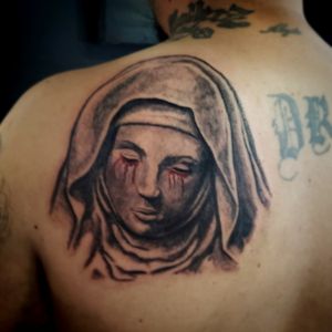 Virgin Mary with Bleeding eyes 