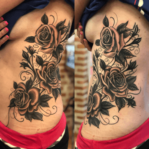 Black and grey roses on ribs