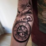 Clock tattoo by Jones Larsen #JonesLarsen #LacunaTattoo #realism #realistic ##mashup #tattoodoapp #tattooartist #tattooidea #cooltattoo #copenhagen #denmark #clock #time #watch #realism #blackandgrey #arm