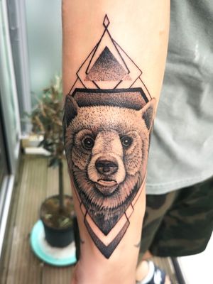 Bear with geometric and dotwork background 