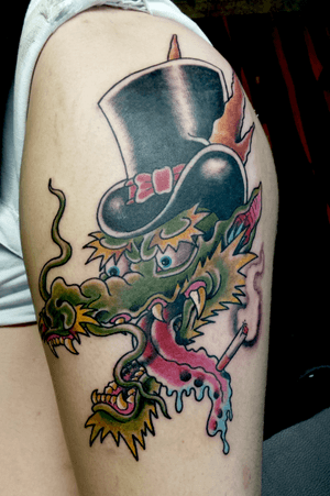 2 classic tattoo images mashed together. The Dragon and Mr Lucky. My favorite thing to do.