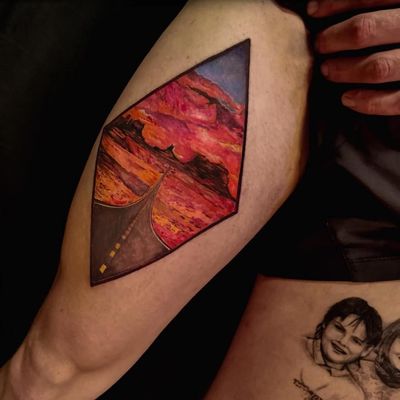 Long road tattoo by Jones Larsen #JonesLarsen #LacunaTattoo #realism #realistic ##mashup #tattoodoapp #tattooartist #tattooidea #cooltattoo #copenhagen #denmark #road #landscape #sunset #desert #leg #color