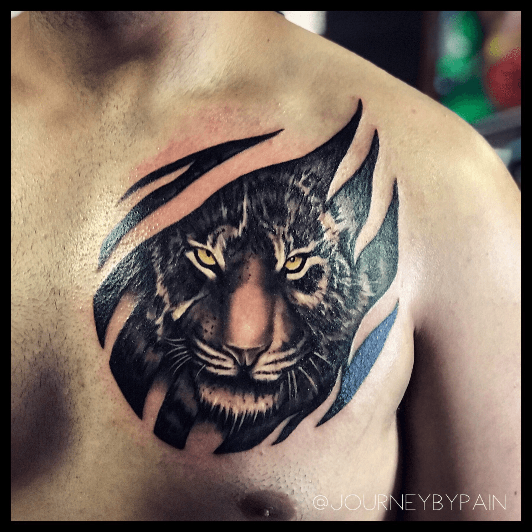 tribal tiger chest tattoo