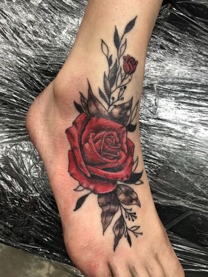 Fun foot tattoo! You gotta love roses! 