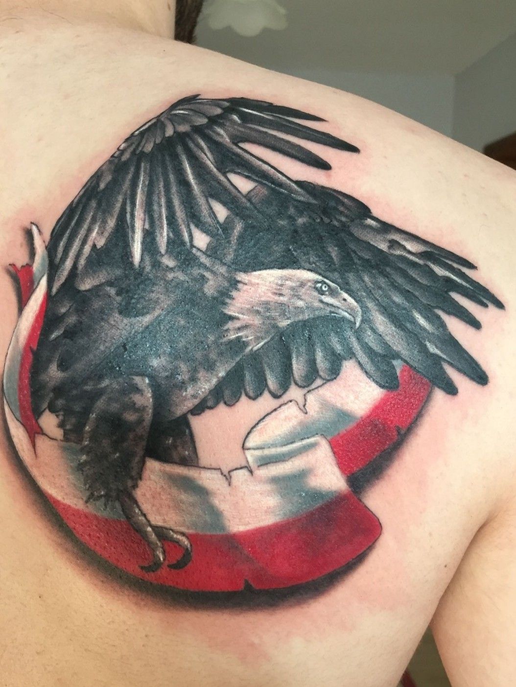 I want to use the Polish Eagle for my second tattoo but also plan to have a  pirate ship scene done Would it be better to have this on my peck and