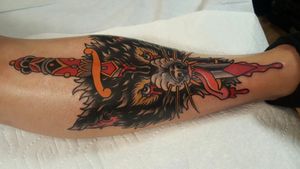  traditional American wolf and dagger