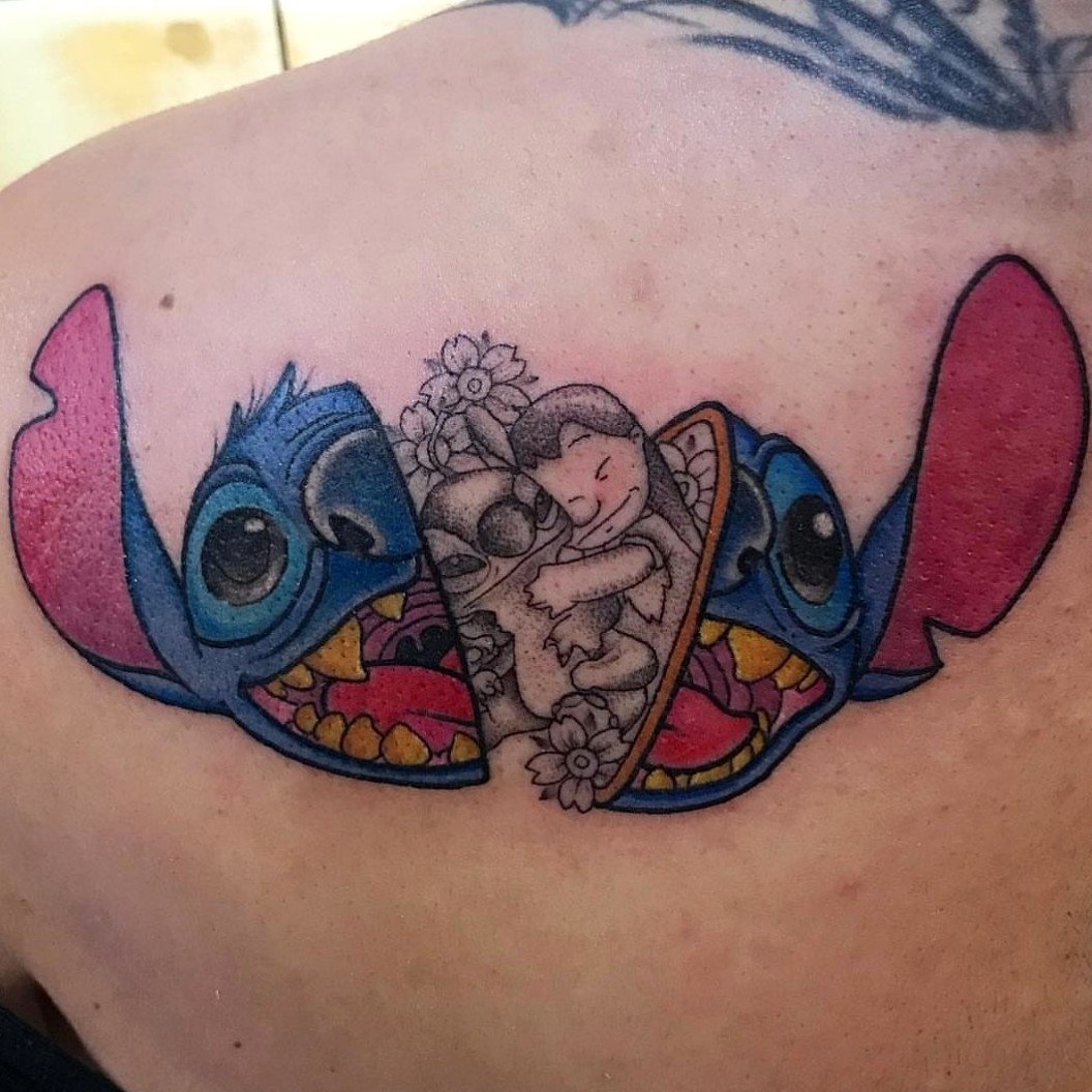 Tattoo uploaded by Kira Pelton  Disneys Stitch disney LiloandStitch  stitch flowers ohana StitchOhana ohanameansfamily  Tattoodo