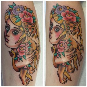 Traditional American girl head bust blonde holding lion cub hand flowers peonies