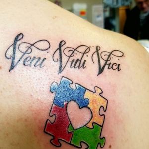 3 Latin words (I came, I saw, i conquered) for all the times I wanted to give up but didnt. The puzzle piece for Autism because it's what I specialized in in college. 