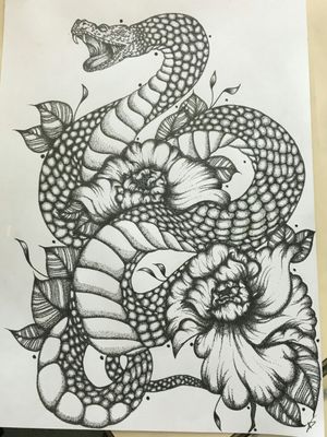 A big snake with some flowers #snaketattoo #snake #flowertattoo #flowerstattoo #blackworktattoo #blackwork #dotworktattoos #dotworkers #dotwork #handpoke #handpoketattoo #ornementaltattoo #ornemental 