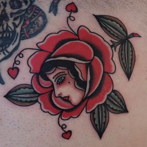 Traditional rose tattoo by Ivan Antonyshev #IvanAntonyshev #traditionalrosetattoo #traditionalrose #rosetattoo #traditionaltattoo #traditional #flower #floral #plant #color #lady #ladyhead #portrait #hearts
