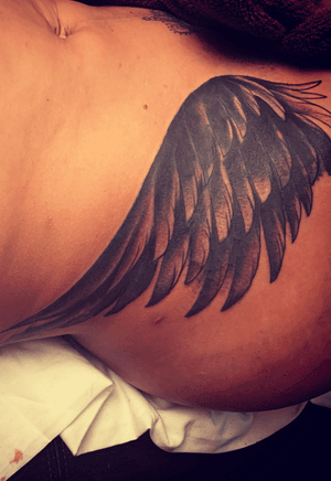 Cover-up design the client requested was a wing which i still wanted the wings to show more thru the cover-up but more of dark transition, md also added more darker areas of the wing to give it that solid dark look. 