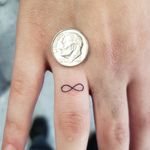 An infinity sign, but thats not a quarter... If you're looking for a new tattoo, Call the shop at 810-695-3333(ask for Jesse), Text only 313-442-3047(My tablet), or DM me. Please like and follow me @tattooedbyjesse FB, IG, SC, pinterest and  www.facebook.com/tattooedbyjesse #TattooedByJesse #ComeGetSomeInk #LoyaltyTattooCompany #DynamicBlack #Tattoo #Tattoos #MichiganTattooArtists #MichiganPiercers #Tattooed #XionTattooMachines #Xion #infinity #finger #dime #micro #tiny #small #little #fine #line #fineline #fingertattoo