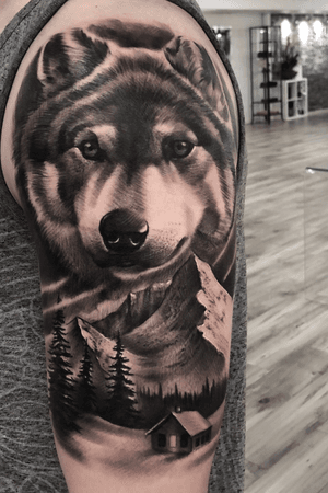Wolf and Snowy landscape. Tattoo by Jesse Misaman 