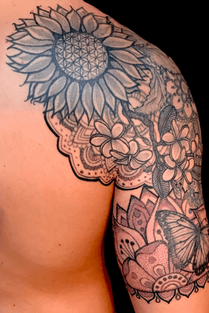 Black and grey half sleeve shoulder piece.. tropical theme with flowers, geometric and dotwork mandalas 
