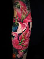 Flower tattoo by Jamie Schene #JamieSchene #TattoodoApp #TattoodoApptattooartist #tattooartist #tattooart #tattooidea #inspiringtattoo #besttattoo #awesometattoo #tigerlily #flower #floral #sleeve #arm #color