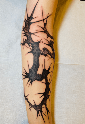 thorn tree blackwork tattoo