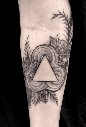 Unique forearm tattoo combining blackwork, dotwork, and illustrative styles by Justin JP Param.
