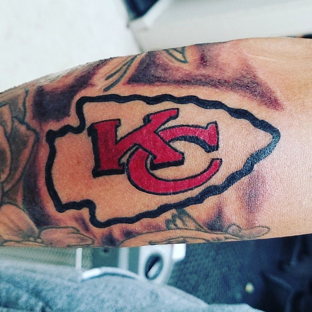 Sioux Falls Tattoo Kansas City Chiefs Football Tattoo On The Leg With Red  And Black Calligraphy  Starry Eyed Tattoos and Body Art Studio