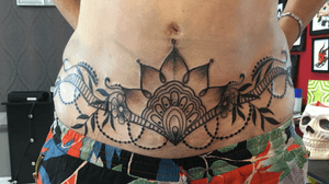 Large henna style tattoo covering a very bad scar