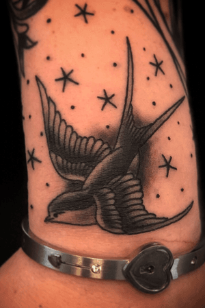Traditional Swallow Tattoo Black and Grey on the wrist