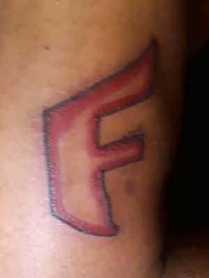  oh shit what y'all know about the falling f?! That bitch is dope as fuk that is my homeboy John Boy at like 8 this morning right after Ryan had finished shading in the red all she's got to do now is at the light in that bitch will be clean as fuck and then it will go from cleanest talk to sick as fuck cuz we're going to add the the five point star in the middle of that bitch then after that we're going to do the diamond and who knows what else is going to happen from there that bitch is going to be sick dope clean all of the above and then some just wait will post pictures as soon as they're done. Hit me up if you need or want some sick ass Ink My do Ryan is a pro and he's good as fuck at what he does I'll clean needles any color ink you want any tattoo you want he got you at a good price guaranteed promise everything