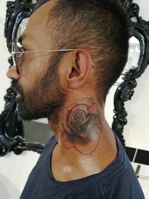 Cover up neck tattoo.