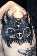 Heavy black dark arts tattoo 