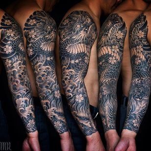 Tatuaje de manga de Mike Rubendall #MikeRubendall #sleeve tattoos #bones #arm sleeves #sleeves # full sleeve # half sleeve #tattooidea #japanese #irezumi #dragon #waves #tiger #cherryblossom #blackandgrey