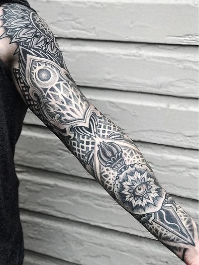Sleeve tattoo by Aries Rhysing #AriesRhysing #sleevetattoos #legsleeve #armsleeve #sleeve #fullsleeve #halfsleeve #tattooidea #eye #dotwork #Linework #pattern #mandala #fire #sacredgeometry