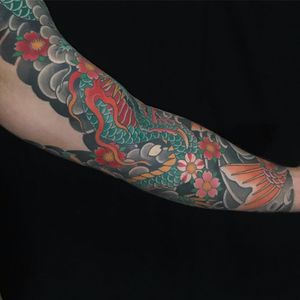Sleeve tattoo by Chris Garver #ChrisGarver #sleevetattoos #legsleeve #armsleeve #sleeve #fullsleeve #halfsleeve #tattooidea #japanese #irezumi #dragon #koi #cherryblossoms
