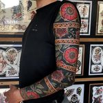 Sleeve tattoo by Joe Tartarotti #JoeTartarotti #sleevetattoos #legsleeve #armsleeve #sleeve #fullsleeve #halfsleeve #tattooidea #flower #floral #pattern #traditional