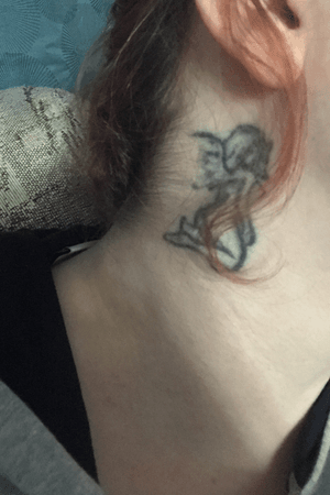 I hate this tattoo, the artist did such a shitty job, i have a matching devil on the opposite side. I wear my hair down in public to hide these. I want to get them covered, but first i have to go through the process of removal since every artist i have spoke with cannot cover them with the dark thick line work. 