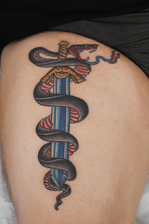 Snake and dagger by Travis Luckhurst