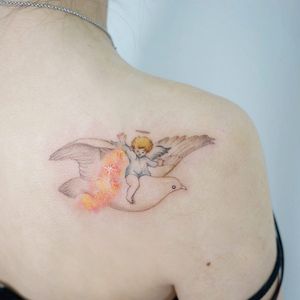 Angel tattoo by Tattooer Manda #TattooerManda #angeltattoo #angeltattoos #angels #wings #feathers #cherubs #religious #spiritual #shoulder #back #dove #sparkle #magic #halo #cute #stars