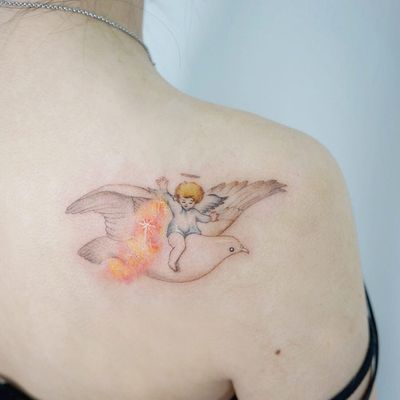 Angel tattoo by Tattooer Manda #TattooerManda #angeltattoo #angeltattoos #angels #wings #feathers #cherubs #religious #spiritual #shoulder #back #dove #sparkle #magic #halo #cute #stars