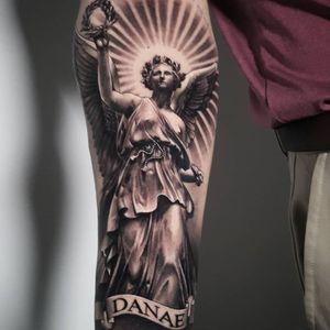 Angel tattoo by Dani Moreno Garcia #DaniMorenoGarcia #angeltattoo #angeltattoos #angels #wings #feathers #cherubs #religious #spiritual #blackandgrey #realism #banner #light #name #arm