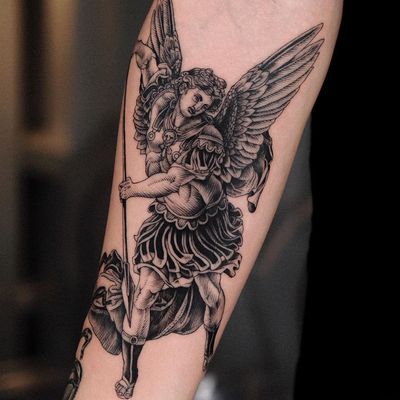 Angel tattoo by Hanstattooer #Hanstattooer #angeltattoo #angeltattoos #angels #wings #feathers #cherubs #religious #spiritual #michael #illustrative #linework #arm