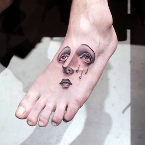 Cool tattoo by Ana Tattooer #AnaTattooer #anaandcamille #TattoodoApp #TattoodoApptattooartist #tattooartist #tattooart #tattooidea #inspiringtattoo #besttattoo #awesometattoo #foot #eyes #tears #portrait