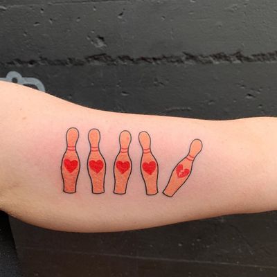 Cool tattoo by Who Tattooed You #Who #WhoTattooedYou #TattoodoApp #TattoodoApptattooartist #tattooartist #tattooart #tattooidea #inspiringtattoo #besttattoo #awesometattoo #bowling #hearts #brokenheart #illustrative #arm