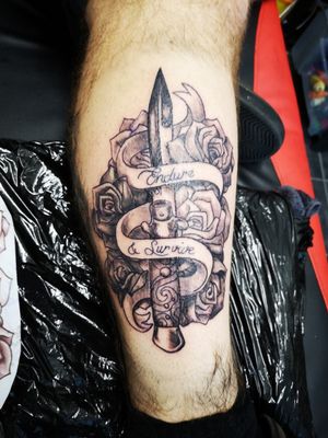 Switchblade and rose tattoo